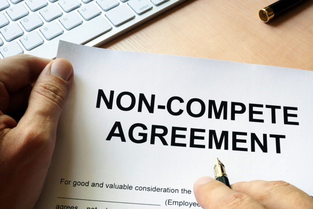 Close-up of non-compete agreement paperwork used in dental practice sales at Otten-Rey Dental Sales