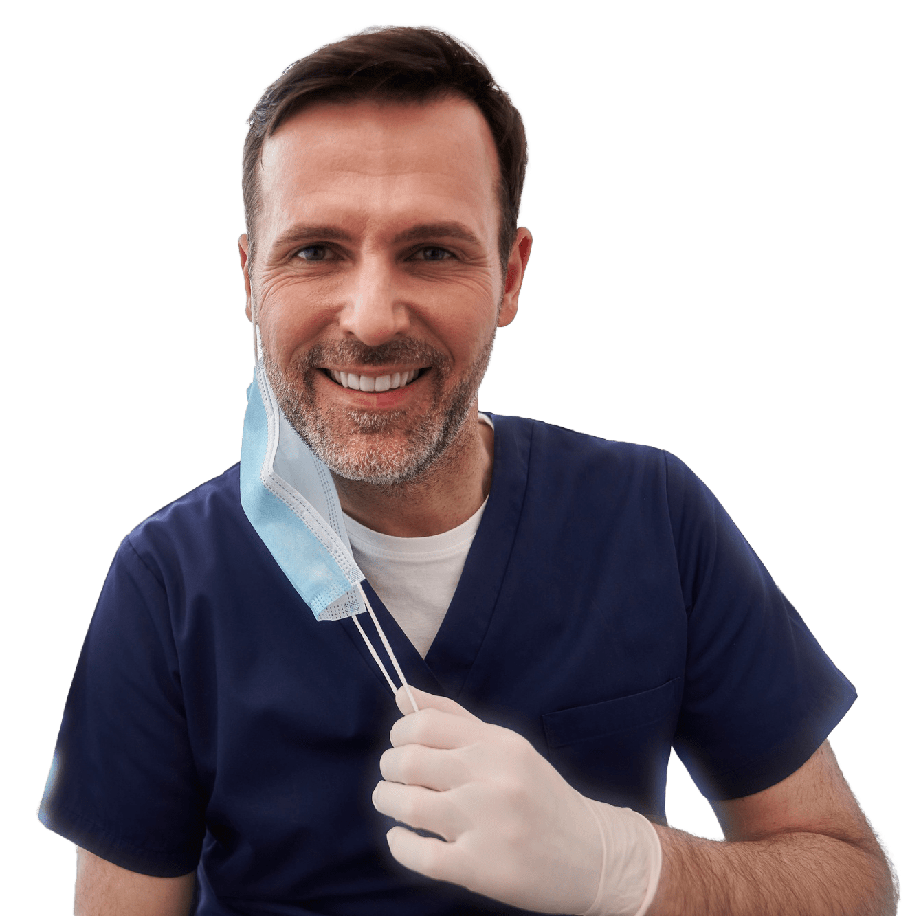 Smiling male dentist in scrubs removing face mask, representing trusted dental professionals with Otten-Rey Dental Sales.