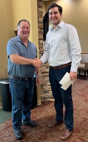 Handshake between dentist and buyer after completing a dental practice sale with Otten-Rey Dental Sales