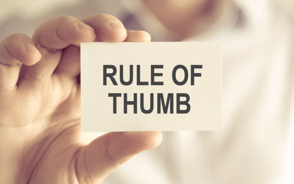 Card reading rule of thumb symbolizing dental practice valuation myths