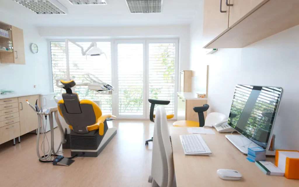 Bright dental office interior with exam chair prepared for practice appraisal