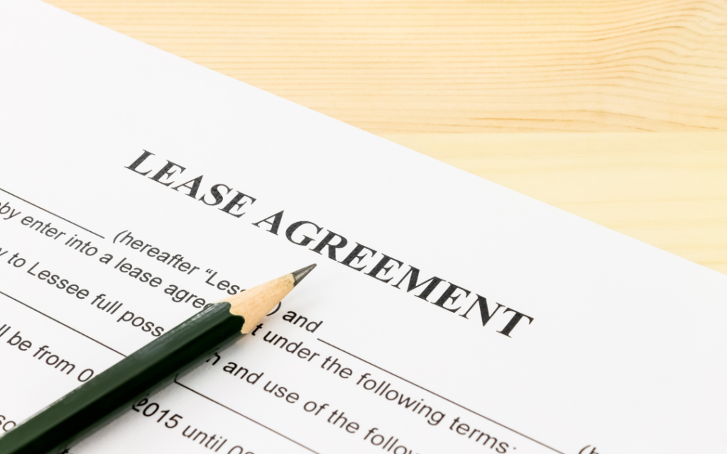 Dental office lease agreement paperwork during practice valuation review